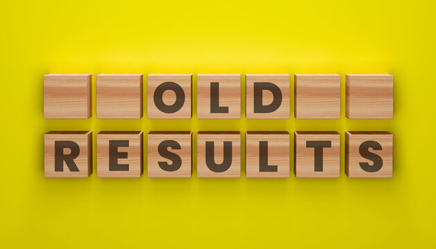 Old Results Word Blocks on Yellow Background: Wooden blocks displaying OLD RESULTS against a vibrant yellow backdrop, symbolizing outdated information or past outcomes. A concept image for data.