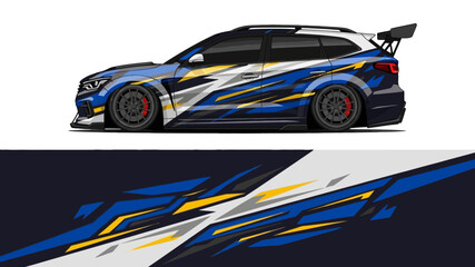 Sleek blue race car with dynamic yellow graphics and spoiler. © AhzaArdiansyah