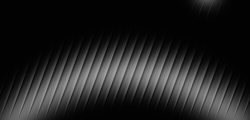 Abstract photograph featuring rhythmic diagonal lines created by light and shadow to produce a striking monochromatic pattern of modern texture © mis