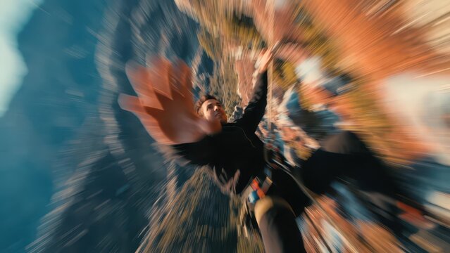 Extreme sports thrill: Man freefalling with outstretched hand, blurred motion effect