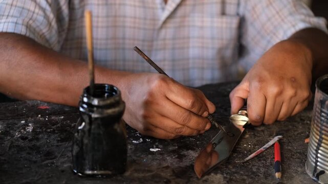 man drowing on the knife