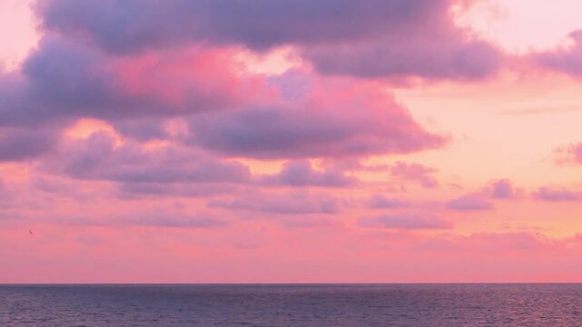 Amazing relaxing sea view multi colored sky puffy clouds sun time lapse, evening bay beach sky clouds, summer colorful sunset ocean in sun light, motion, travel, vacation.