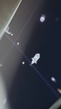 Small animated rocket icon with exhaust fumes