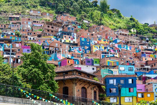 Colombia, Medellin,  Comuna 3,  Manrique, colourful painted houses built on a slope. 