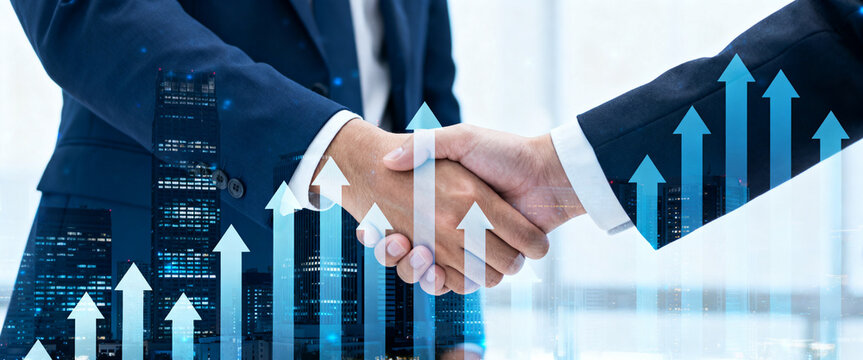 Successful Business Partnership Two Professionals Shaking Hands with a Digital Background of Growth Charts