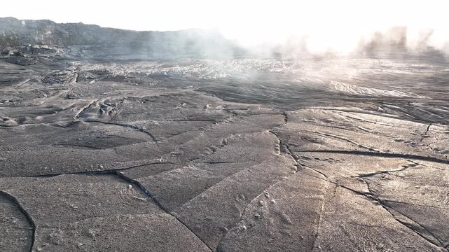 Aerial view of cracked volcanic ground and rising steam in the Danakil Desert Dalol, Afar, Ethiopia.