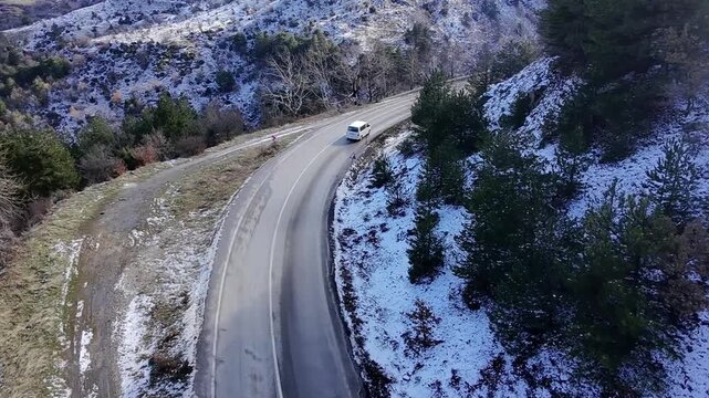 Snowy serpentine road on Bozdag Mount Tmolus Manisa, Lydian heritage tourism winter traverse Anatolia Turkey