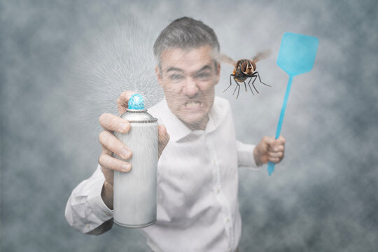Angry man killing insects
