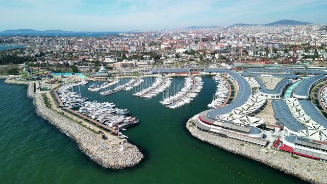 Istanbul Viaport Marina, Boats and sailboats berthed at marina circling shot