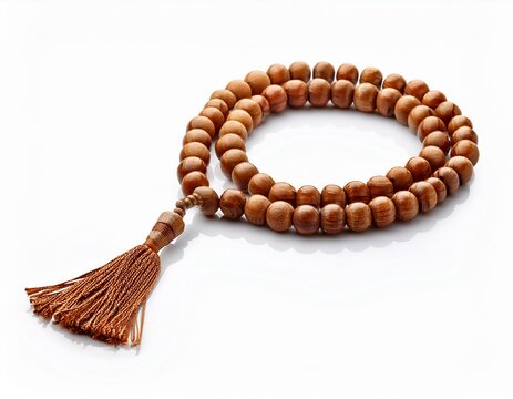 wooden islamic prayer beads tasbih with tassel isolated on white background