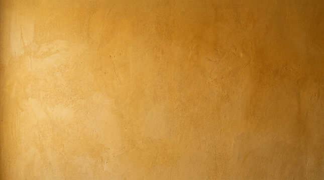 Textured golden wall, abstract stucco background