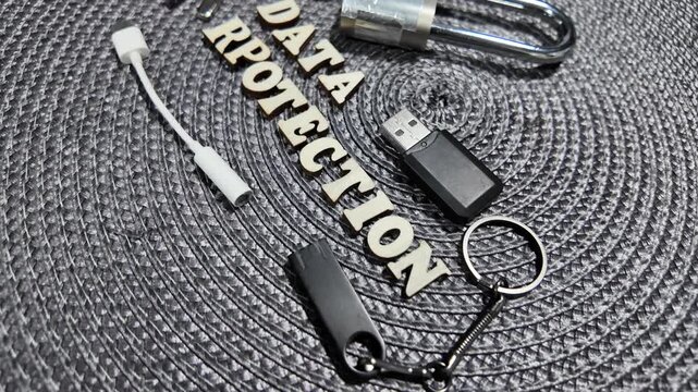 Padlock, keys, and USB drive with Data Protect text