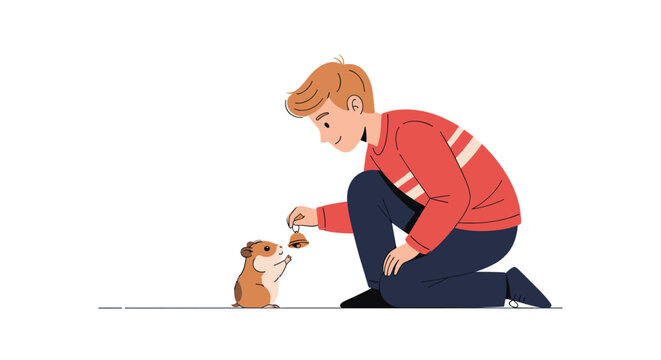 Young boy kneeling on the ground and playing with his pet hamster by offering a small bell in a gentle and caring interaction for bonding time.