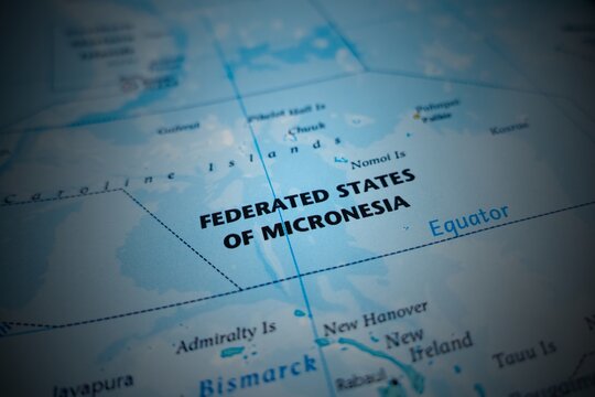 Map of Federated States of Micronesia with round vignette. Selective focus on label, close-up view
