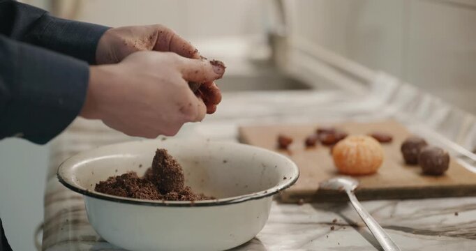 Caucasian man prepares desert at kitchen at home. 4K 10-bit