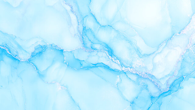 Soft blue marble texture with white veins and subtle sparkle for backgrounds or design elements