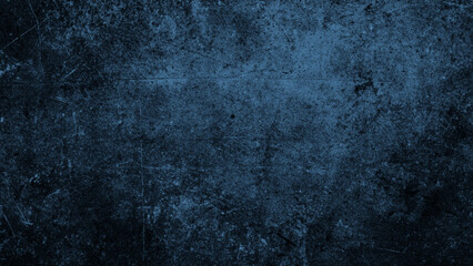 Fototapeta premium Dark blue grungy textured background with scratches and scuffs for design and layout