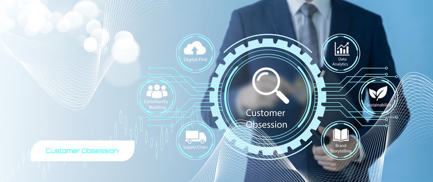 Business professional emphasizing customer obsession with digital technology and interconnected business concepts