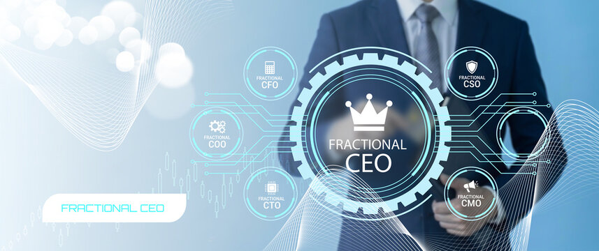 Professional Business Executive Pointing at Digital Display Showing Fractional Executive Leadership Concepts Including CEO CFO CTO CMO Roles