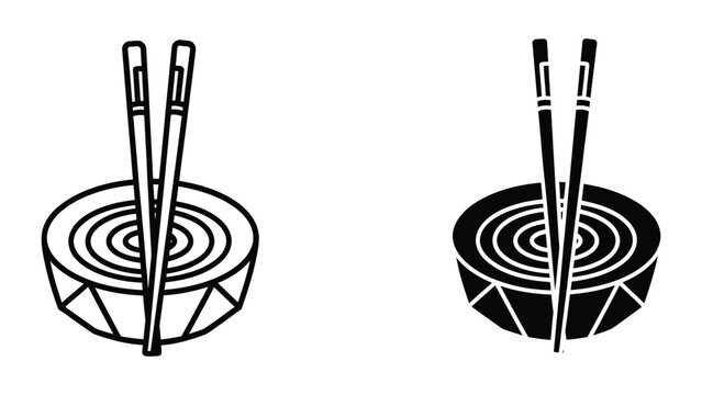 Two pairs of chopsticks resting on bamboo plates with concentric circles