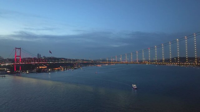 Yellow and Red 15 July Martyrs Bridge Night Lights Drone Video, Kuzguncuk Beylerbeyi District Uskudar, Istanbul Turkiye (Turkey)