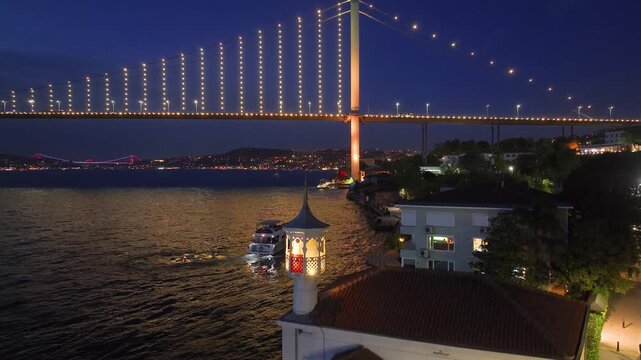Yellow and Red 15 July Martyrs Bridge Night Lights Drone Video, Kuzguncuk Beylerbeyi District Uskudar, Istanbul Turkiye (Turkey)