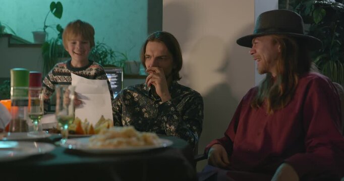 Kid Spend Time with Uncles. Friends Have a Home Party Dinner. 4K 10-bit
