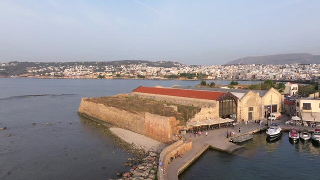 Beautiful Old city, Greece and best scenic places - panorama of picturesque old town Chania. Crete island, Panoramic of the old Venetian port and lighthouse during the blue hour, Travel Concepts
