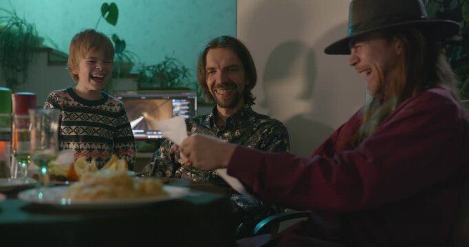 Kid Spend Time with Uncles. Friends Have a Home Party Dinner. 4K 10-bit