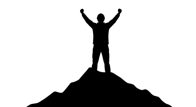 Man Standing on Mountain Peak.