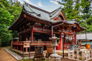 Obraz premium Shinto shrine at Takao Mountain (Takao-san), Tokyo, Japan.