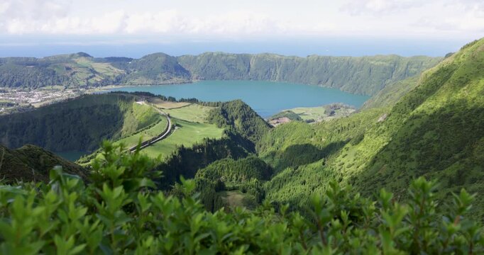 A mountain range with a volcanic lake in the foreground at Sete Cidades.
