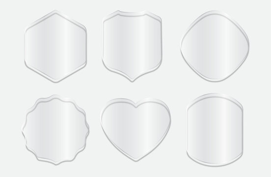 Collection of six white blank labels with various shapes