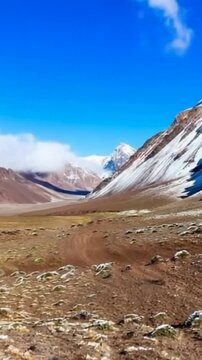 Aconcagua, a mountain in the Andes Mountains between Chile and Argentina. Time lapse in vertical video