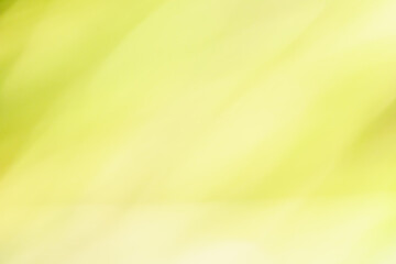 Abstrakcyjne, jasne tło z miękkim rozmyciem w odcieniach żółci i jasnej zieleni. Słoneczna tekstura typu bokeh, idealna jako minimalistyczny podkład do projektów graficznych. © Henryk Niestrój