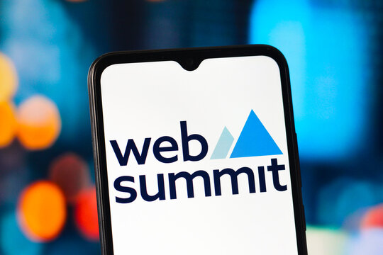 In this photo illustration, the Web Summit logo is seen displayed on a smartphone screen.