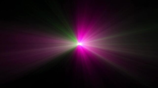 Green magenta light burst splitting on dark background