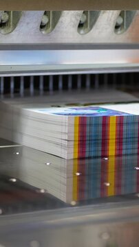 Industrial guillotine paper cutter trimming printed sheets