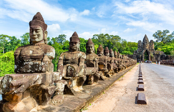 Stone statues leading to Angkor Thom gate