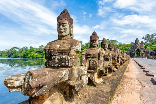 Stone statues leading to Angkor Thom gate