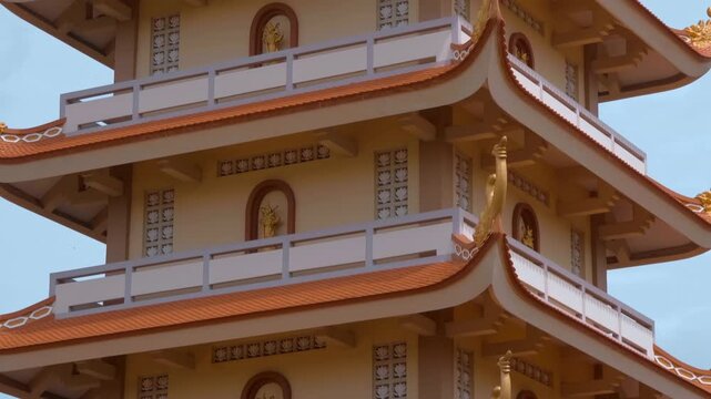 Seven-Story Memorial Tower at the Vinh Trang Pagoda is a 35 meters high seven-tiered structure that blends traditional Vietnamese elements with Khmer and European architectural influences in Ho Chi Mi