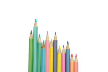 Colored pencils arranged by height isolated on transparent background © Maryna