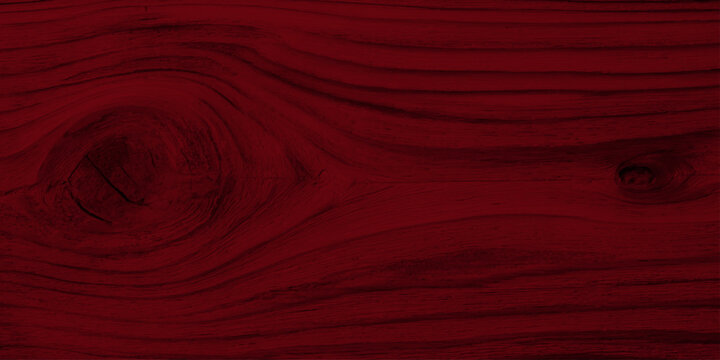 Deep burgundy red wood grain texture background with natural knots; dark crimson stained timber surface for backdrop