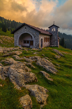 The stone chapel on the high Alps mountain at sunset over the Pragel Pass in Canton Schwyz, Switzerland