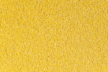 Fototapeta premium Millet grain texture creating natural food background
