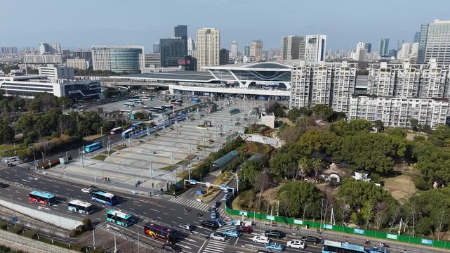 Ningbo modern transport hub with residential city aerial daytime view | 4K aerial drone footage