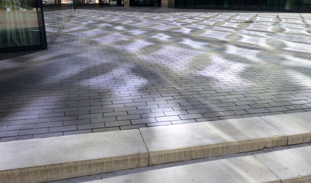 Сaustics from glass facade on pavement tiles isolated png on a transparent background premium cutout (light reflections, sunlight pattern)
