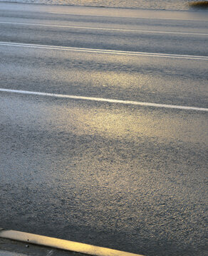 Four-lane road with reflection human height view isolated png on a transparent background premium cutout (asphalt texture, highway surface)