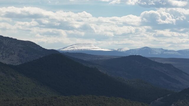 Aerial of snow capped Uinta mountain near Flaming Gorge in north Utah in spring