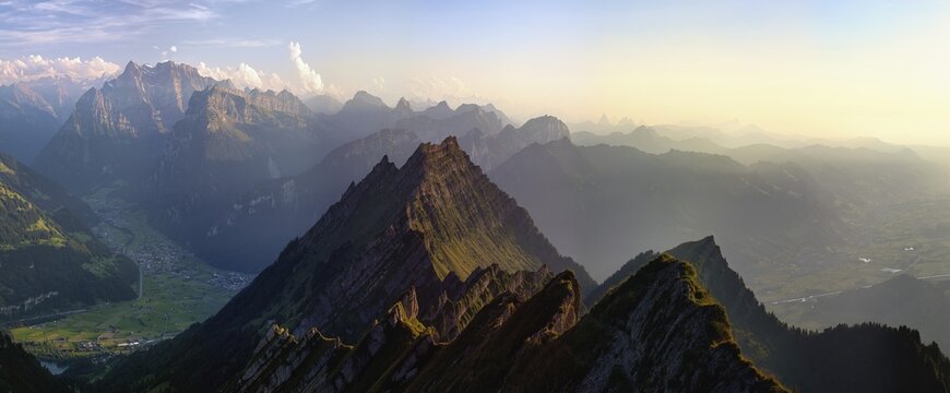 View from Europe's highest Nagelfluhberg Speer, Mount Federispitz with Central Swiss Alps in the evening light, Canton St. Gallen, Switzerland